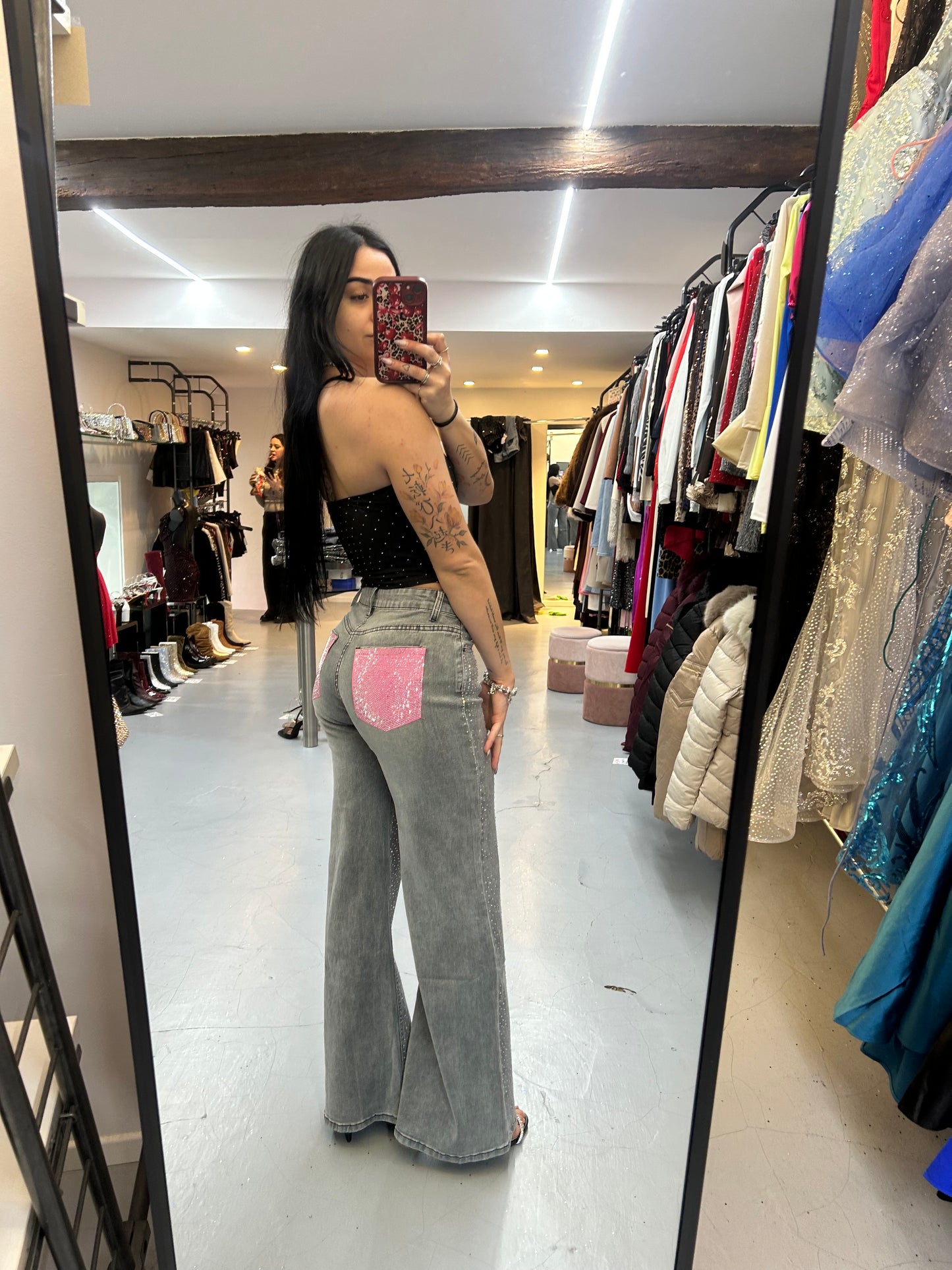 Jeans con tasche rosa